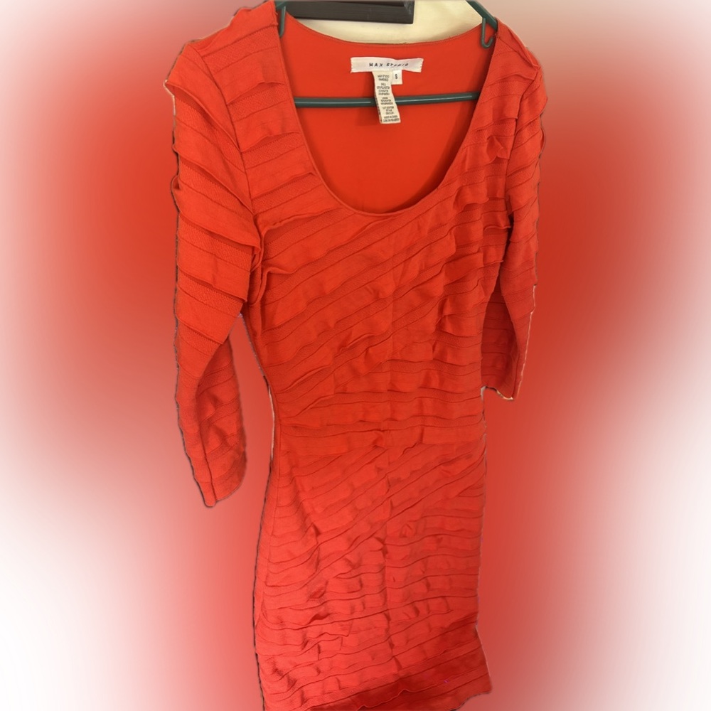 Orange asymmetrical body con business casual quarter sleeve dress.